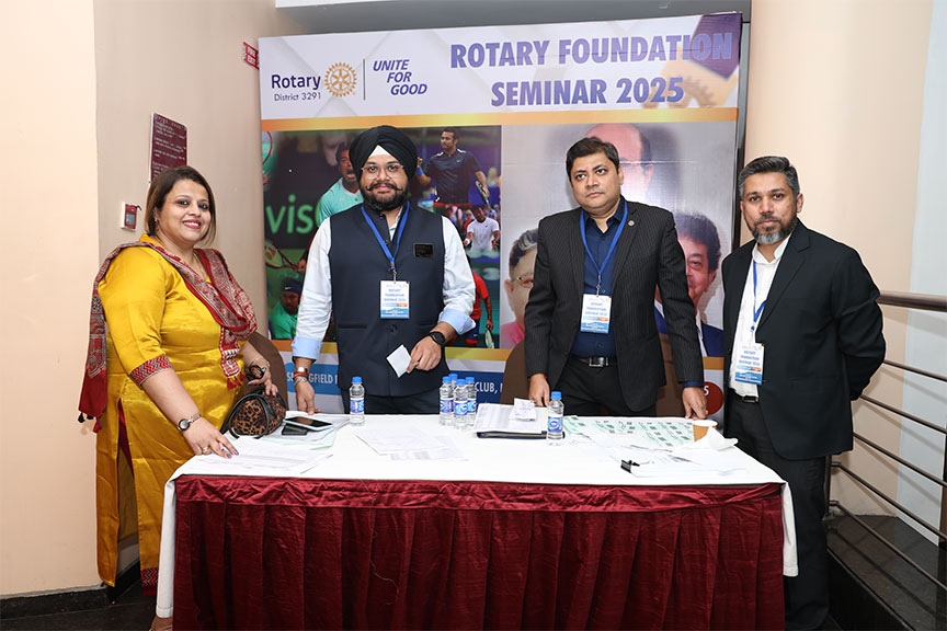 Premium conference setup with rows of chairs and branded podium, Kochi